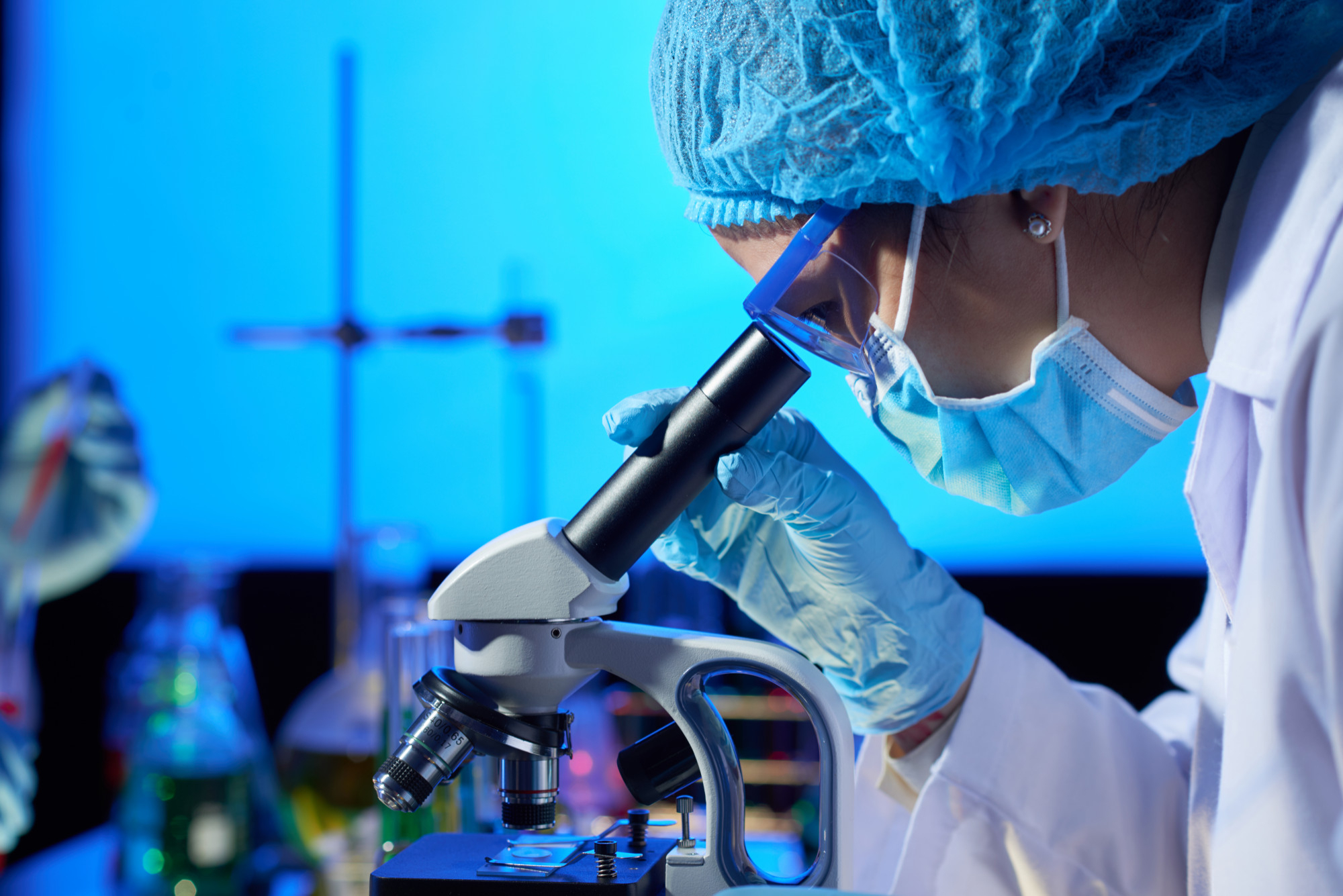 Examining Sample With Microscope.jpg